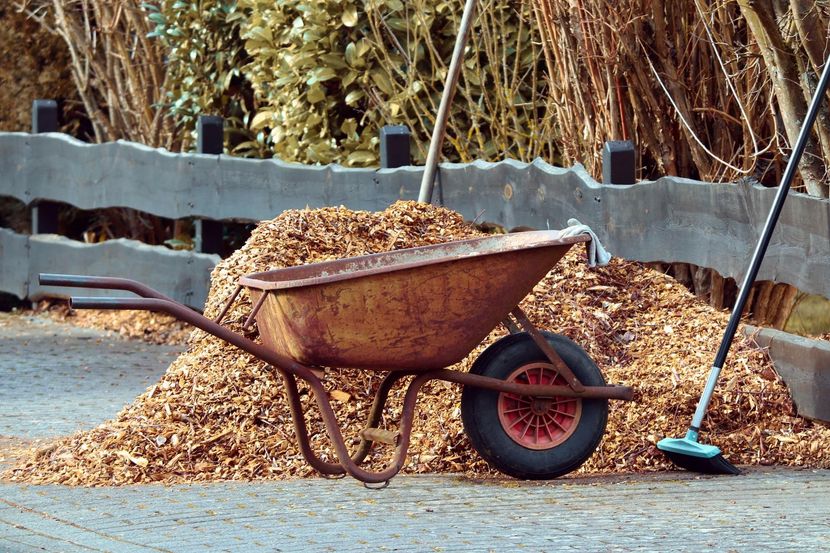 wheelbarrow full of mulch to spread
