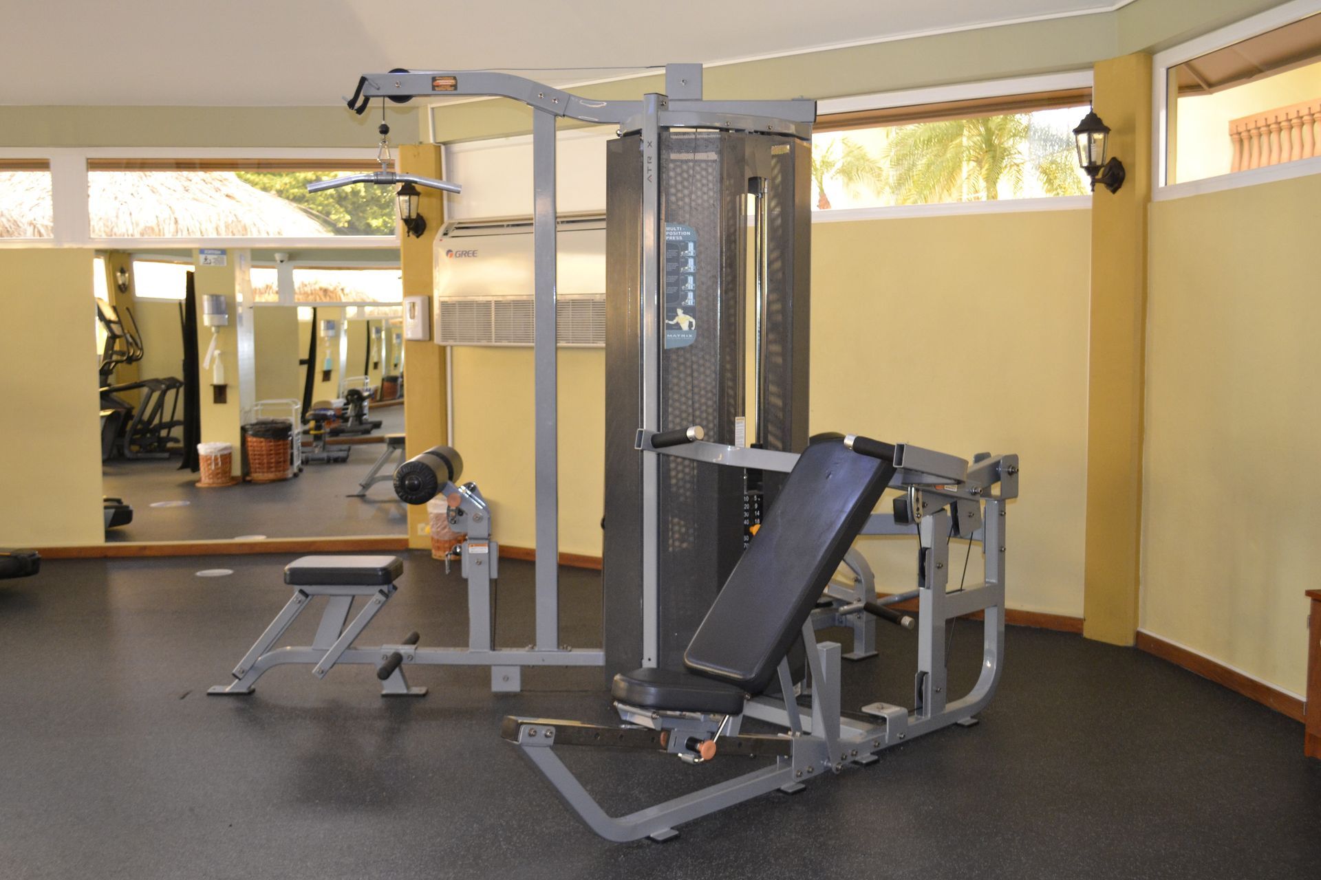 A gym with a bench and a machine that says ' johnson ' on it