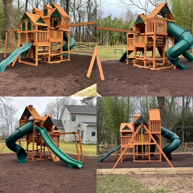 A wooden playground with a green slide and swings
