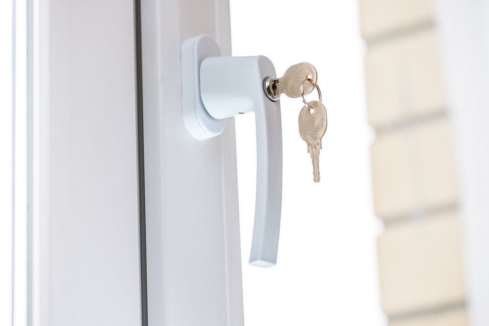 Window Handle with Key in Lock — Door Lock Replacements in Launceston. TAS