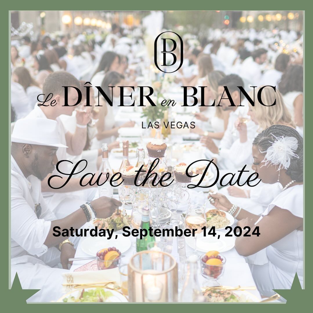 Le Diner En Blanc Las Vegas - A group of people are sitting at a table eating food.