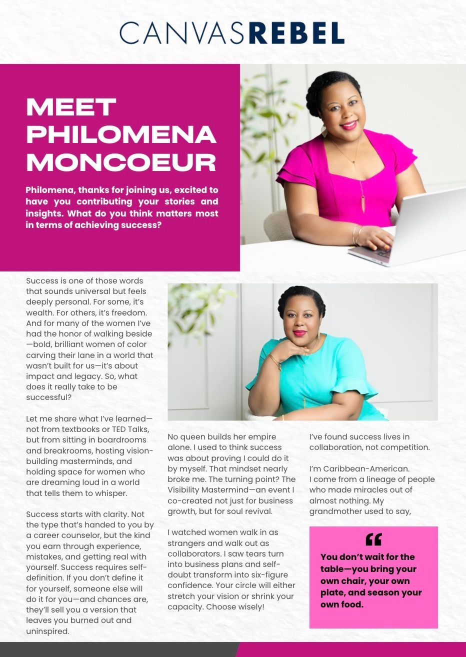 A woman in a pink shirt is sitting in front of a laptop computer.