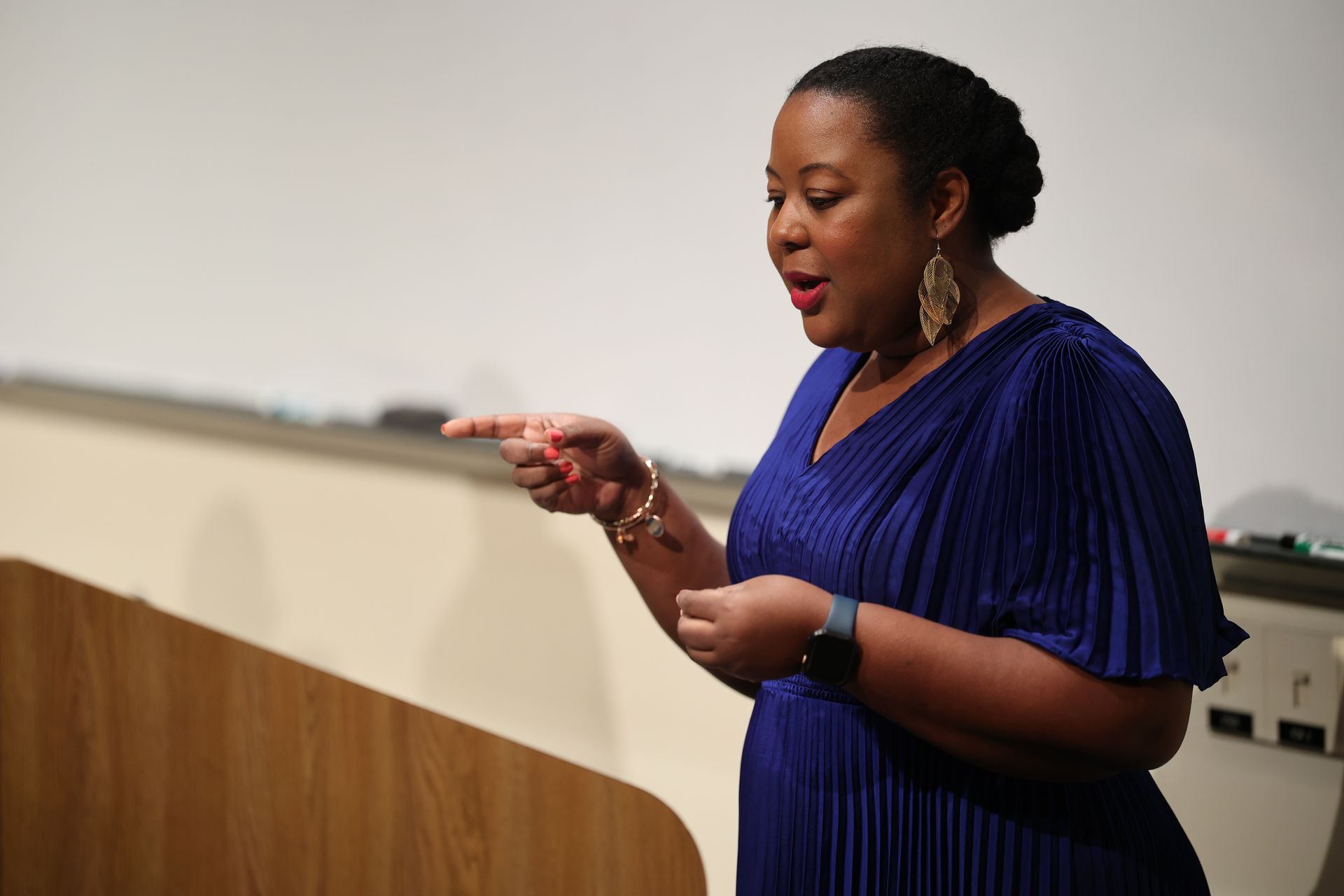 Philomena Teaching at a Conference