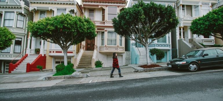 a woman walking up the hill in San Francisco