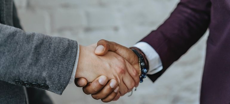 two people shaking hands