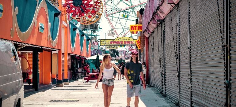 two people walking at the fair