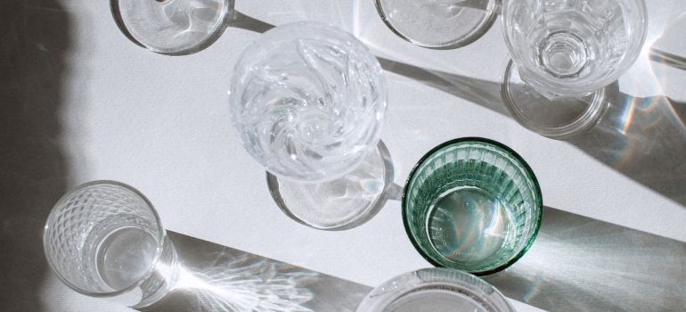 different glasses on a white table