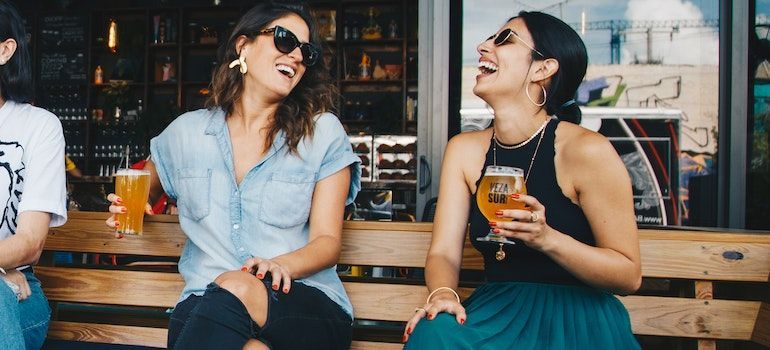 2 women sitting in a bar decided to relocate to San Carlos this winter