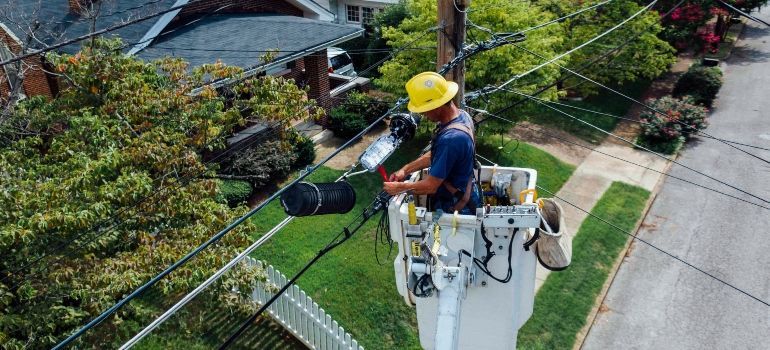 Man fixing electrical wires