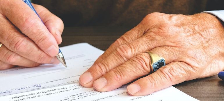 Person Signing Document because he was able to get discounts when moving long distance