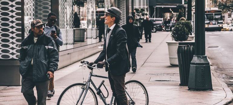 a man on a bicycle on the crosswalk