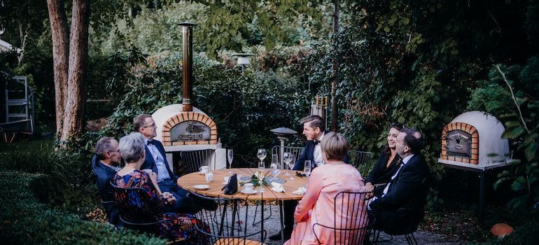 People sitting in a garden.