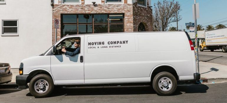 Professional mover in a moving van after you decide to hire movers for a local move in San Francisco