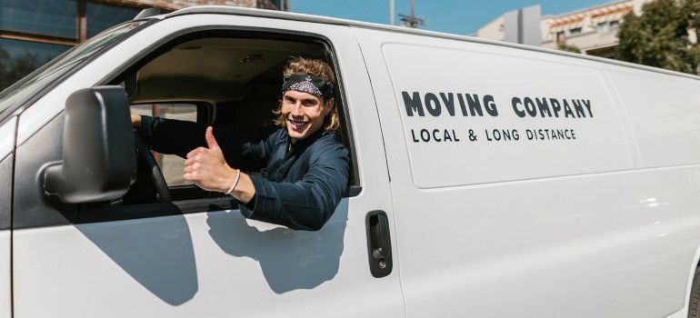 Man driving a moving van