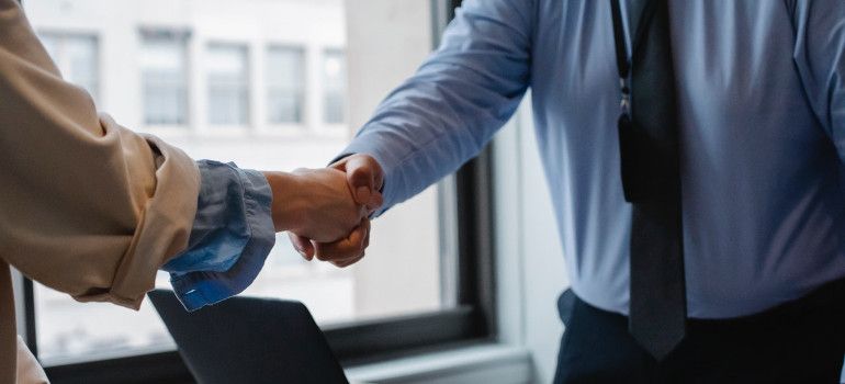 Two people shaking hands