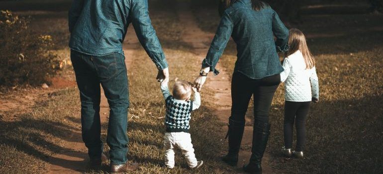 Kids walking with parents