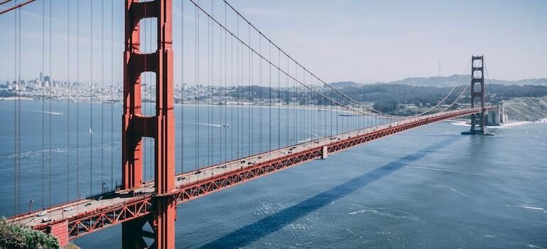 The golden gate bridge is a suspension bridge over a body of water.