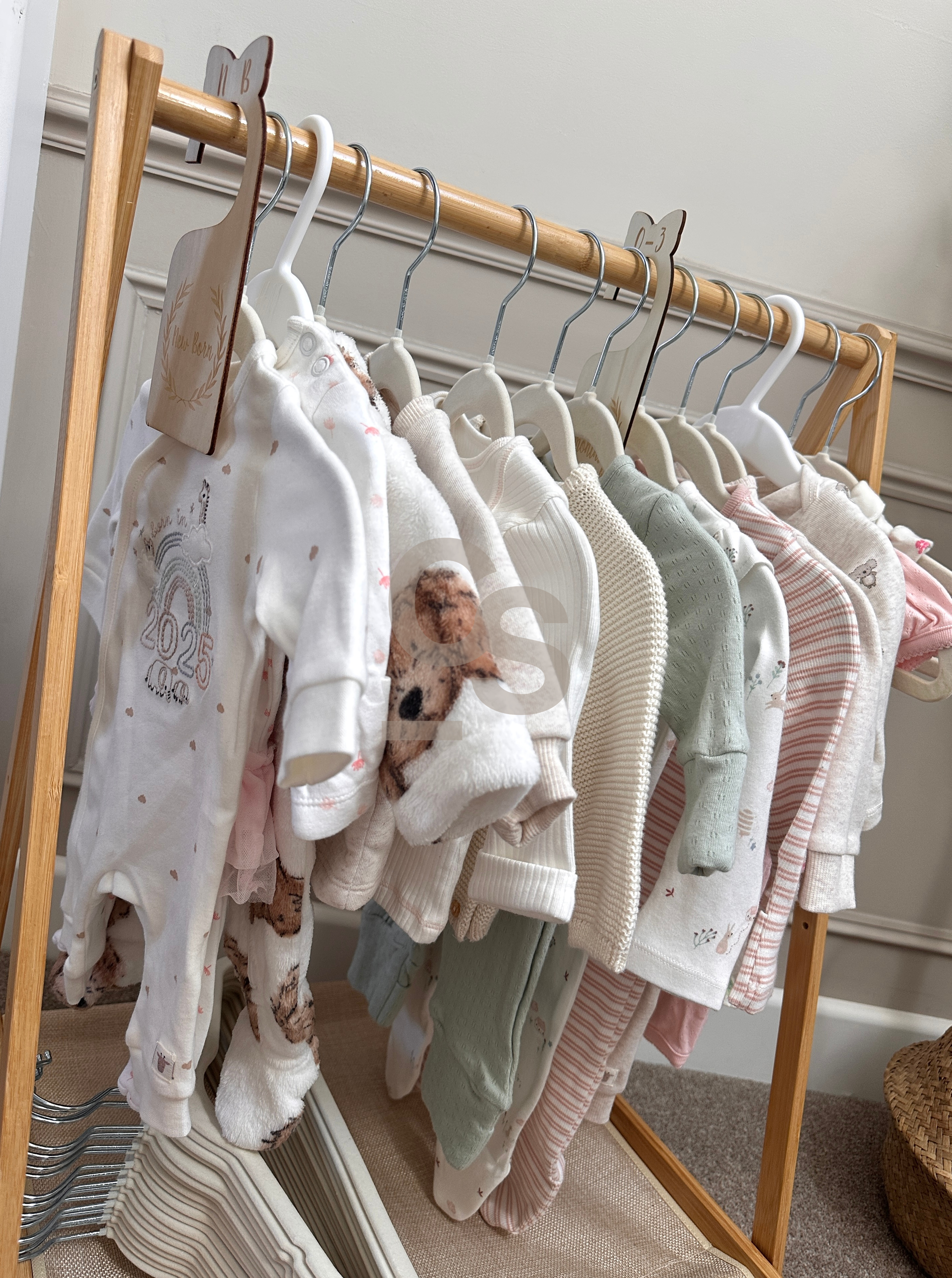 Small rail of baby clothes 