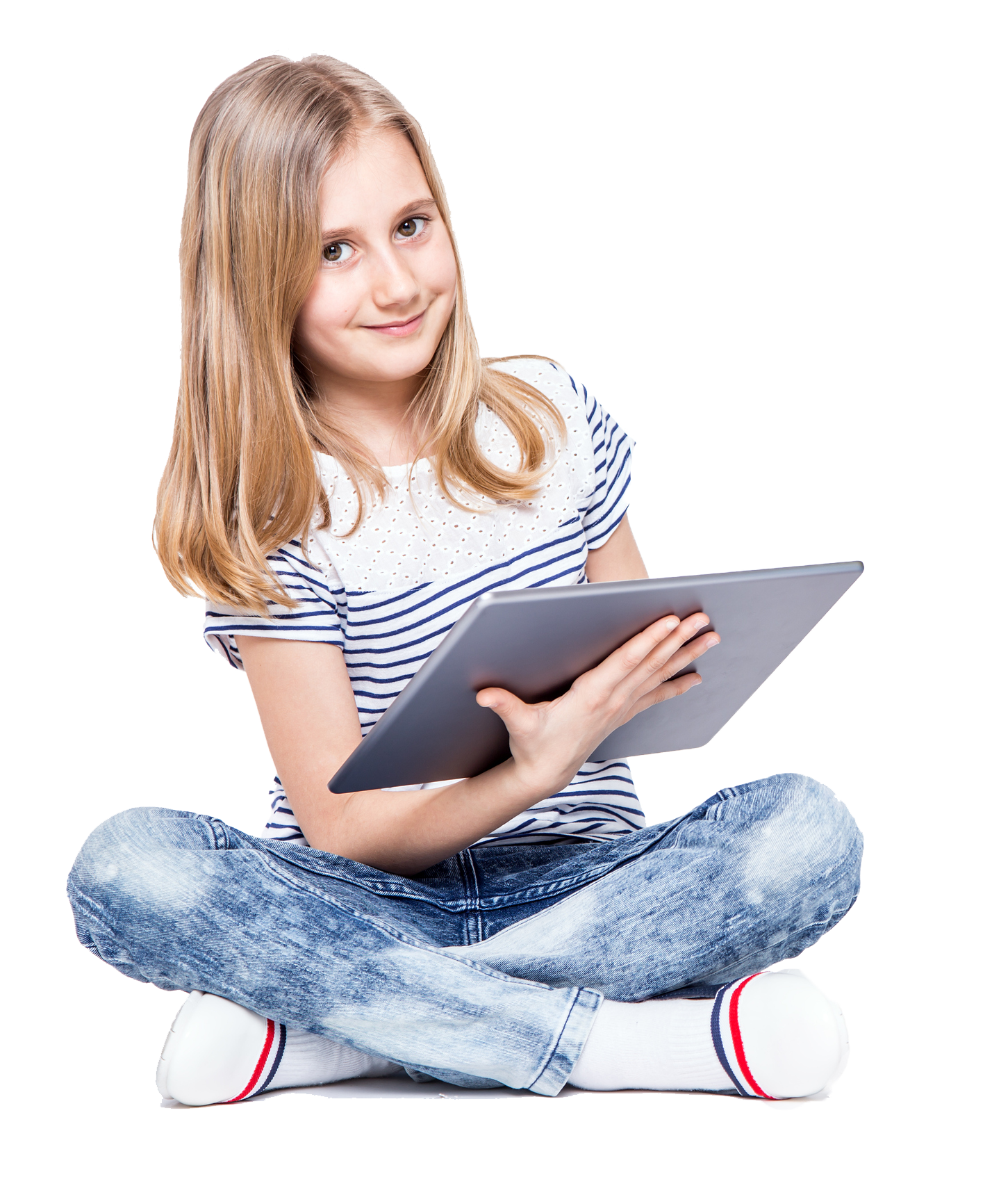 Girl sitting cross-legged, holding a tablet, smiling. She's wearing a striped shirt and jeans, on a white background. Girl sitting cross-legged, holding a tablet, smiling. She's wearing a striped shirt and jeans, on a white background.