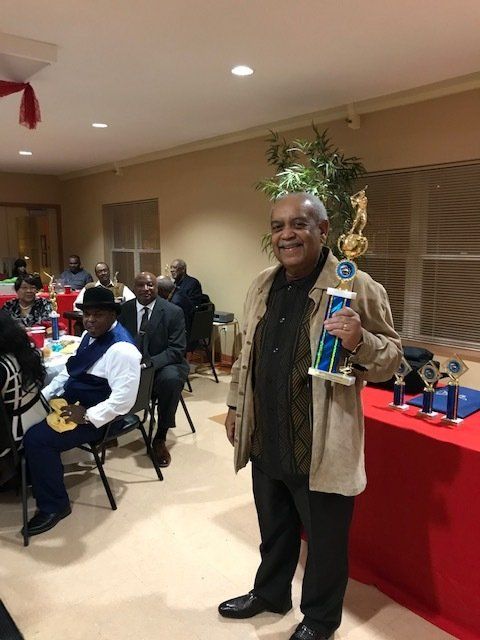 Happy Senior Man With His Trophy — St. Louis, MO — Par or Better Golf Club
