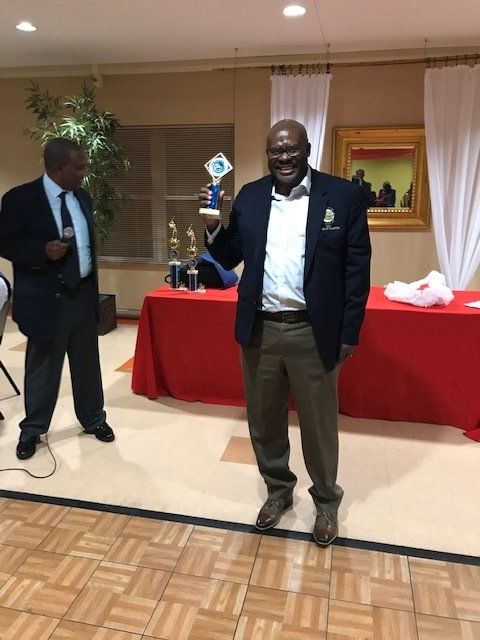Happy Man With Trophy — St. Louis, MO — Par or Better Golf Club