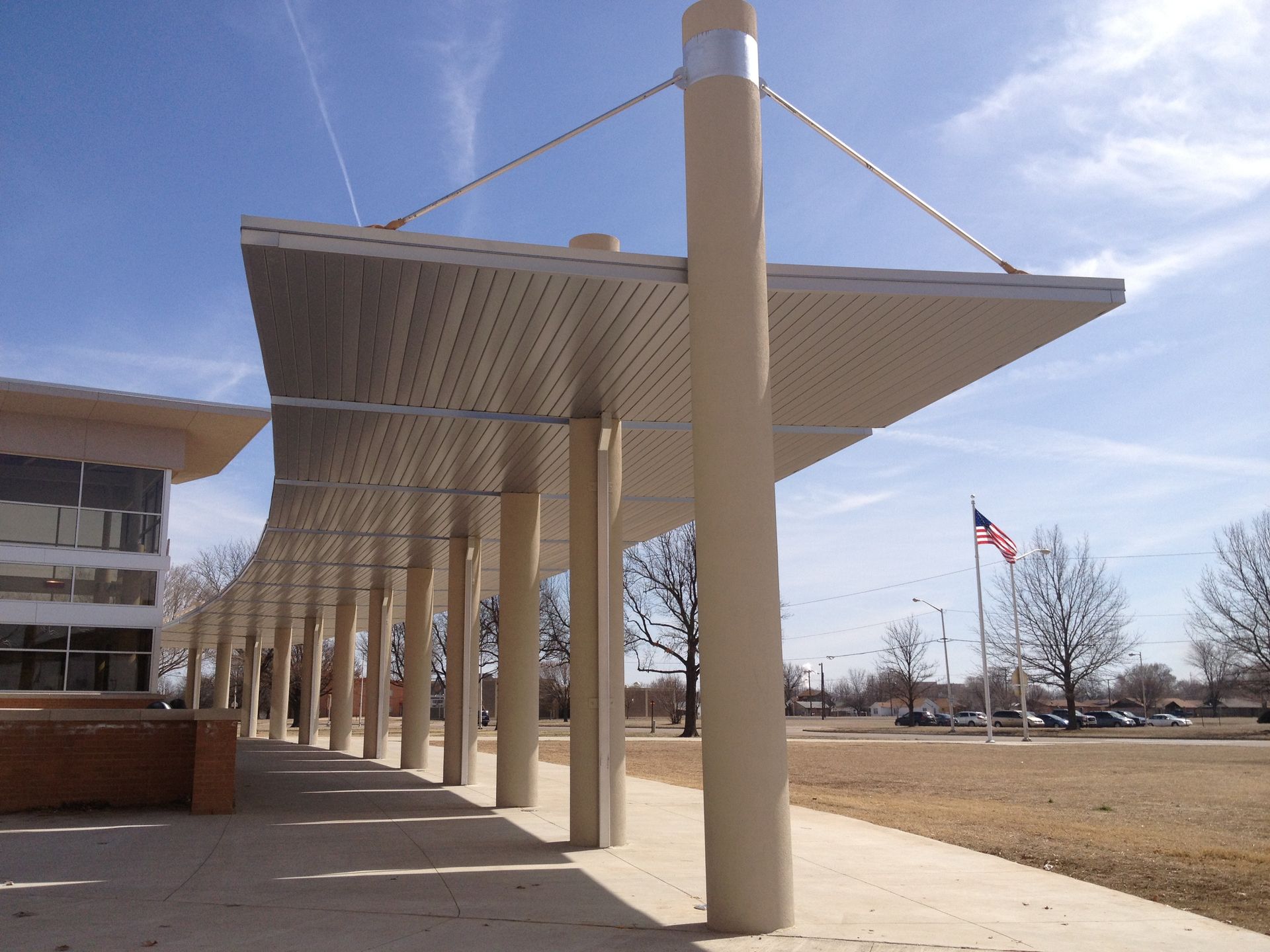 Bloyer & Sons custom architectural metal canopy and roofing at West Middle School in Wichita, KS.
