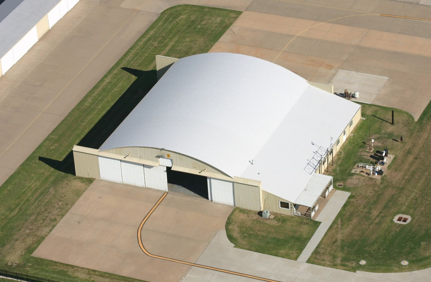 New commercial metal roof installation on an airport hangar in Wichita, the Air Capital of the World