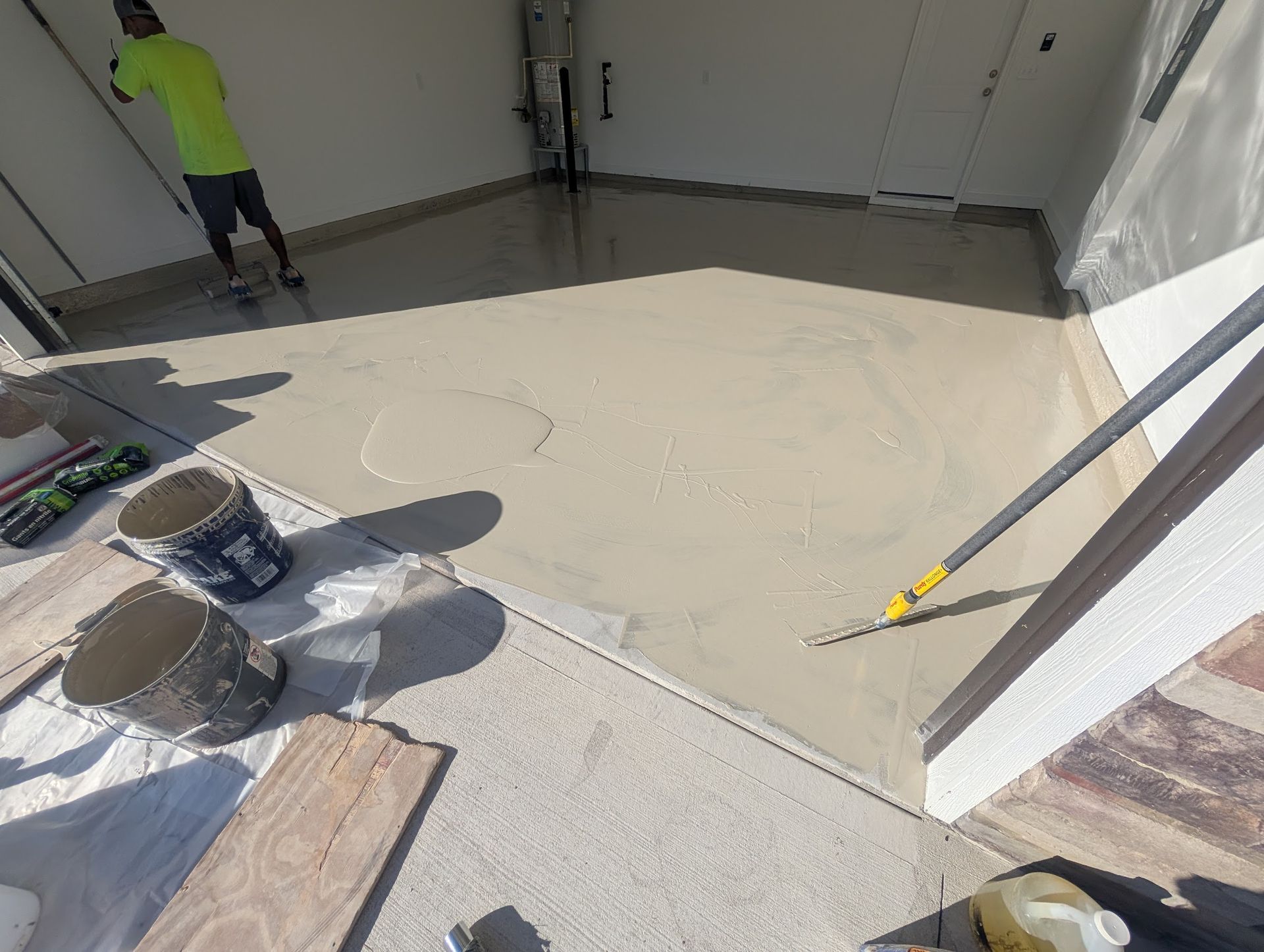 Outdoor Transformations' deep cleaning a paver driveway, restoring its original clean and bright look in St. Johns, FL.