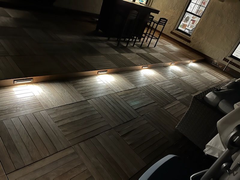 Outdoor Transformations added stair lighting to a home’s porch in Anastasia Island, FL, for safety and style at night.