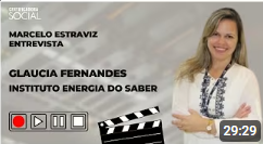 Woman, Glaucia Fernandes, being interviewed. The video title is 