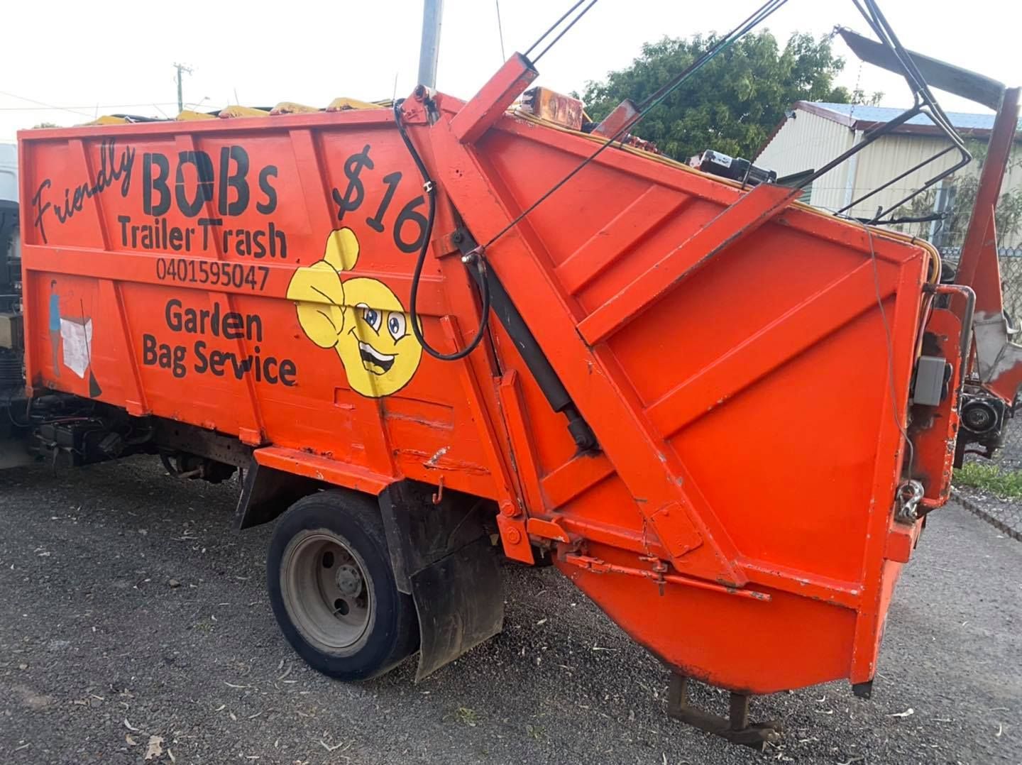 Orange Truck for Grumpy Bob's Trailer Trash — Bob’s Trailer Trash in Gracemere, QLD