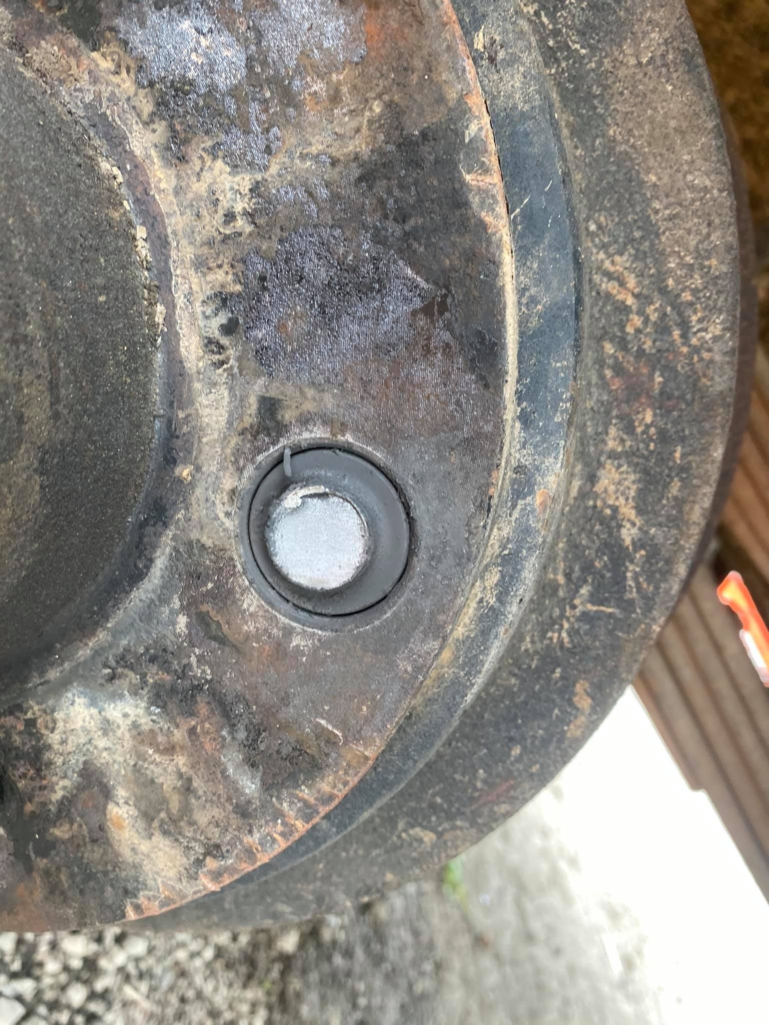 Close-up of a Greasy, Circular Metal Component — Bob’s Trailer Trash in Yeppoon, QLD