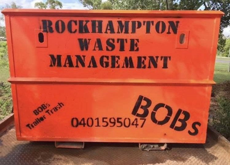 Orange Dumpster With 