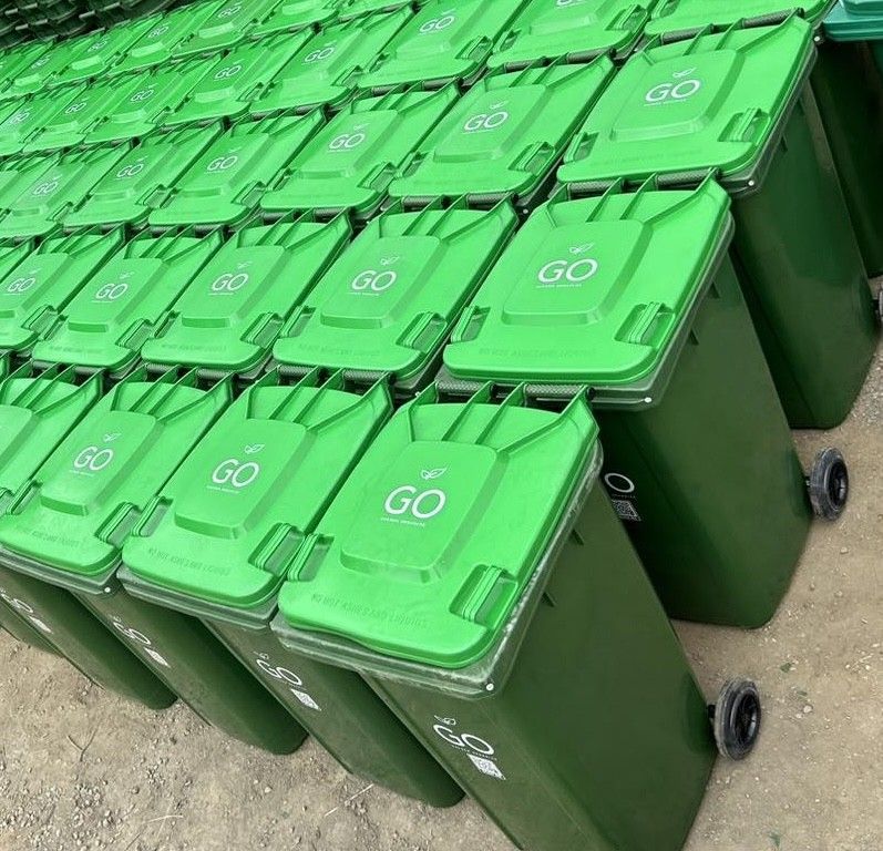 Rows of Green Trash Bins With