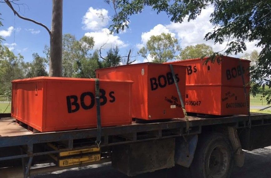 Three Orange Boxes Labeled 