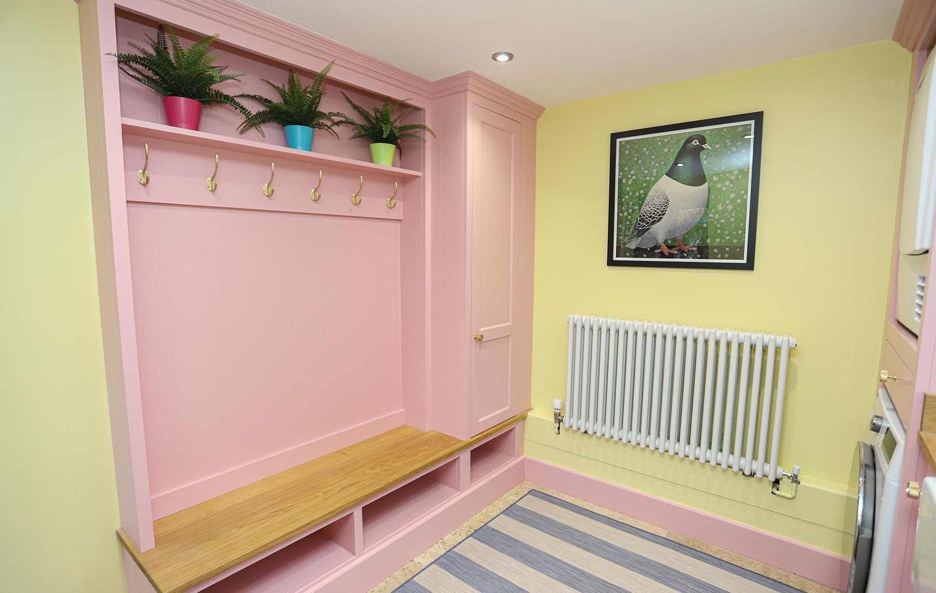 A room with a picture of a pigeon on the wall