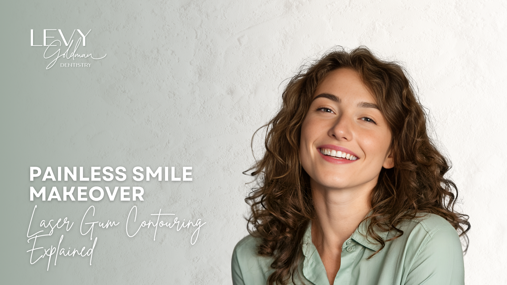 A woman with curly hair is smiling for the camera.