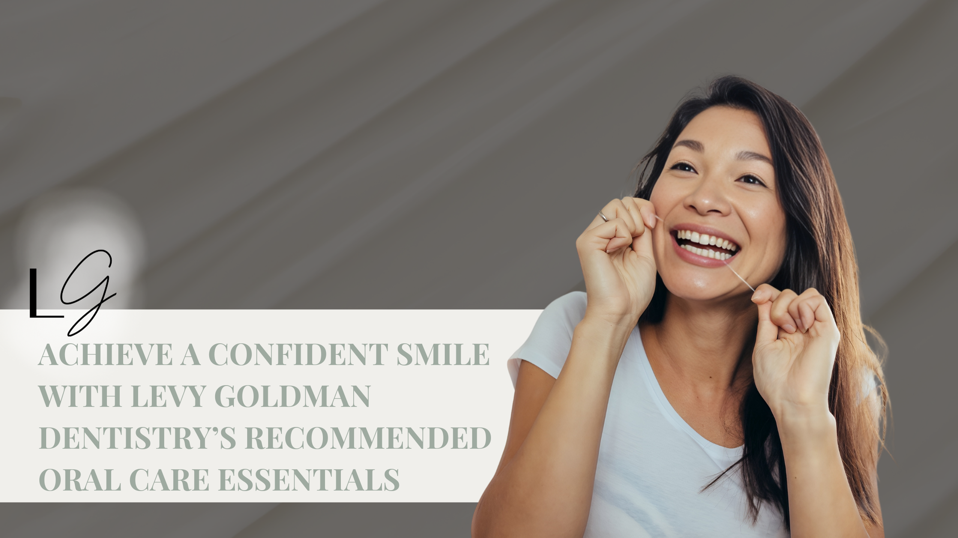 A woman is smiling while flossing her teeth.