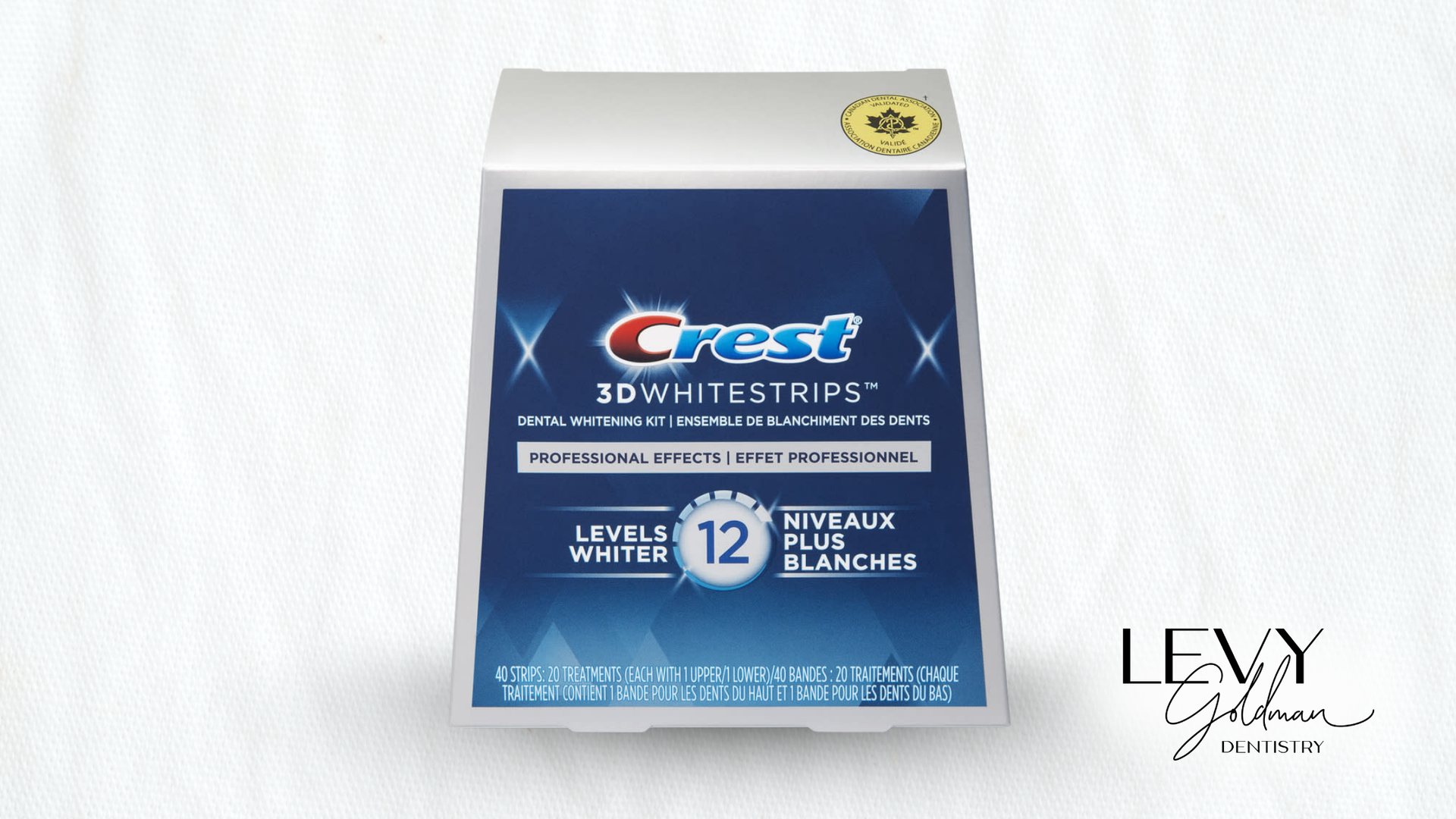 Crest 3D Whitestrips packet, blue and white, with branding and text about teeth whitening.