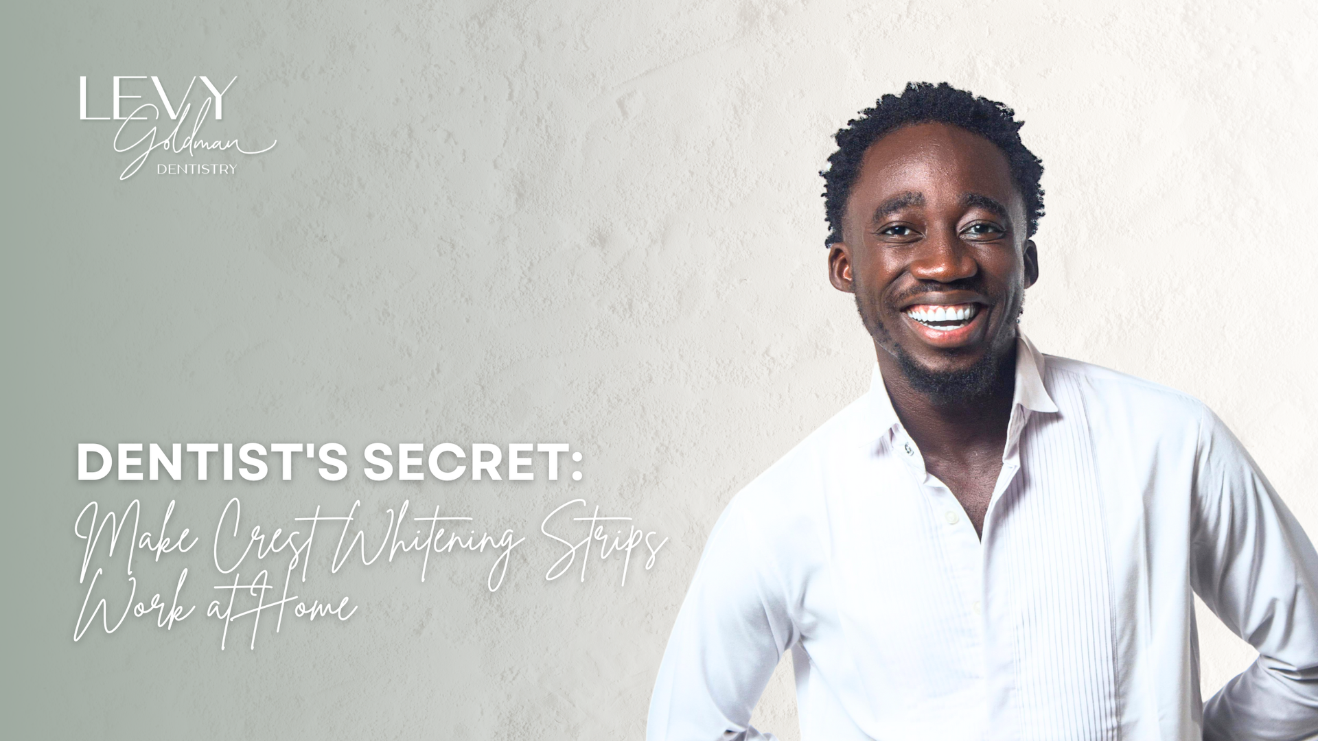 Man in white shirt smiles, text reads