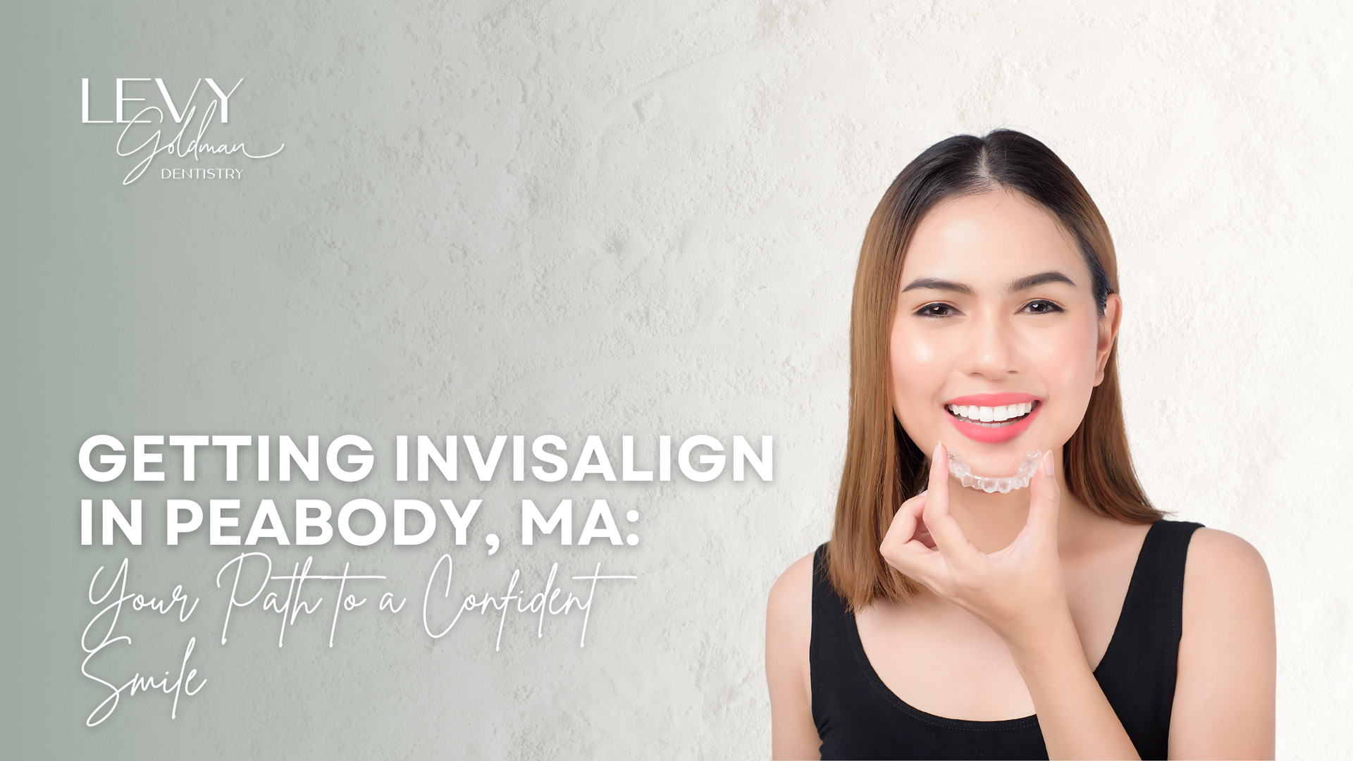 A woman is getting invisalign in peabody , ma.