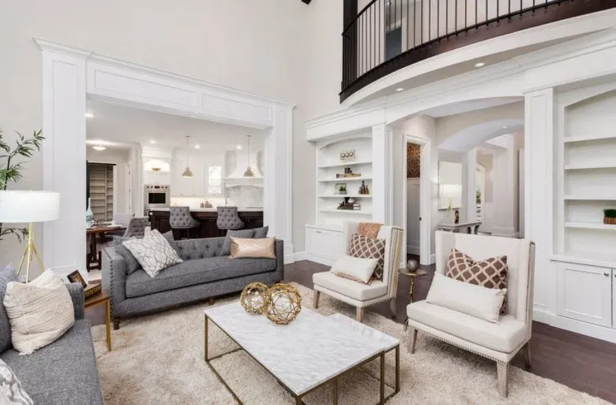 A living room filled with furniture and a coffee table.
