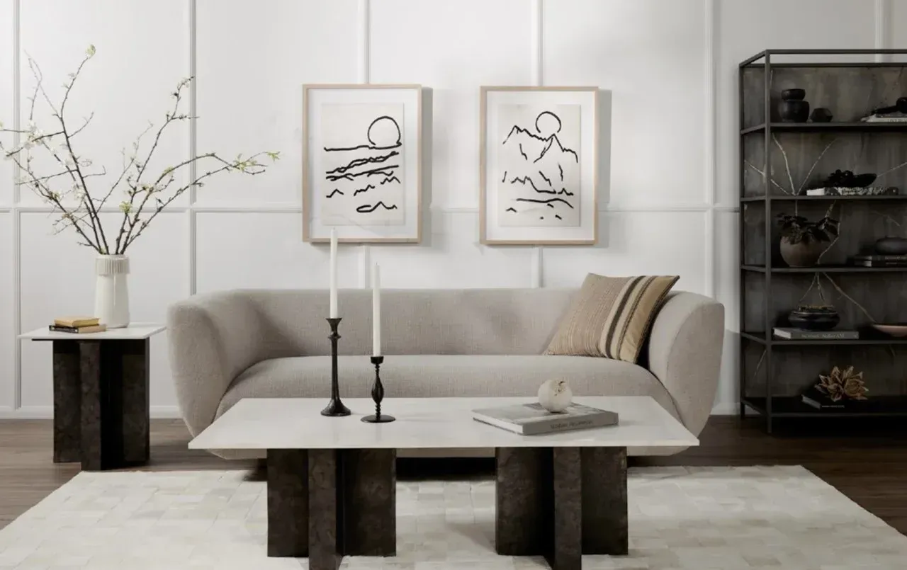 There is a couch and a coffee table in the living room.