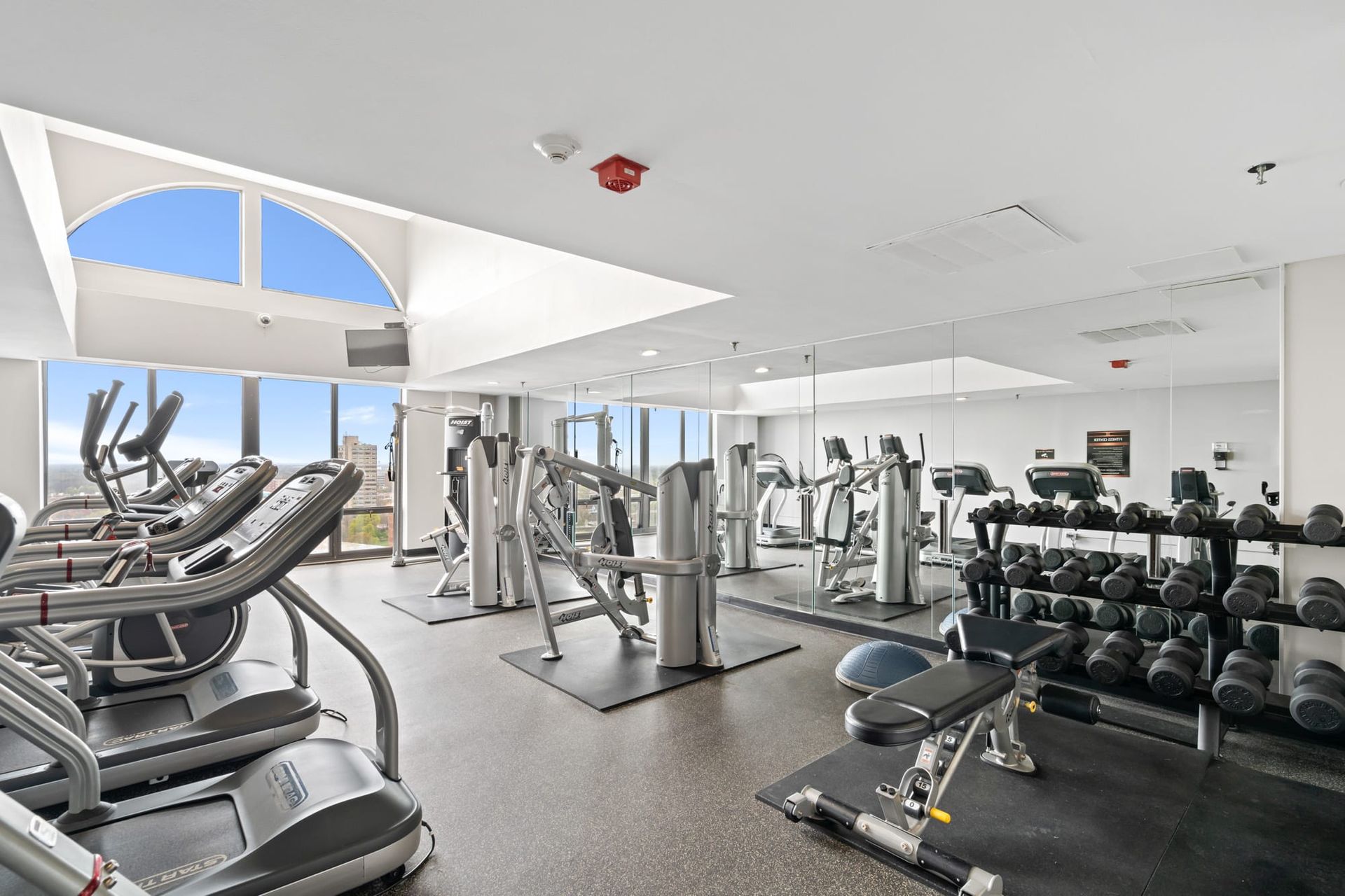 100 Forest Place fitness center with cardio machines and weight equipment