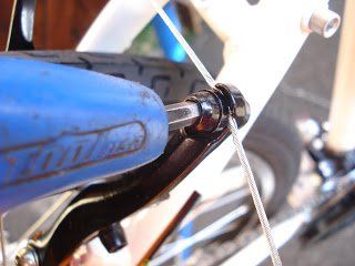 Tighten cable pinch bolt