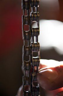 Worn and new chain side by side