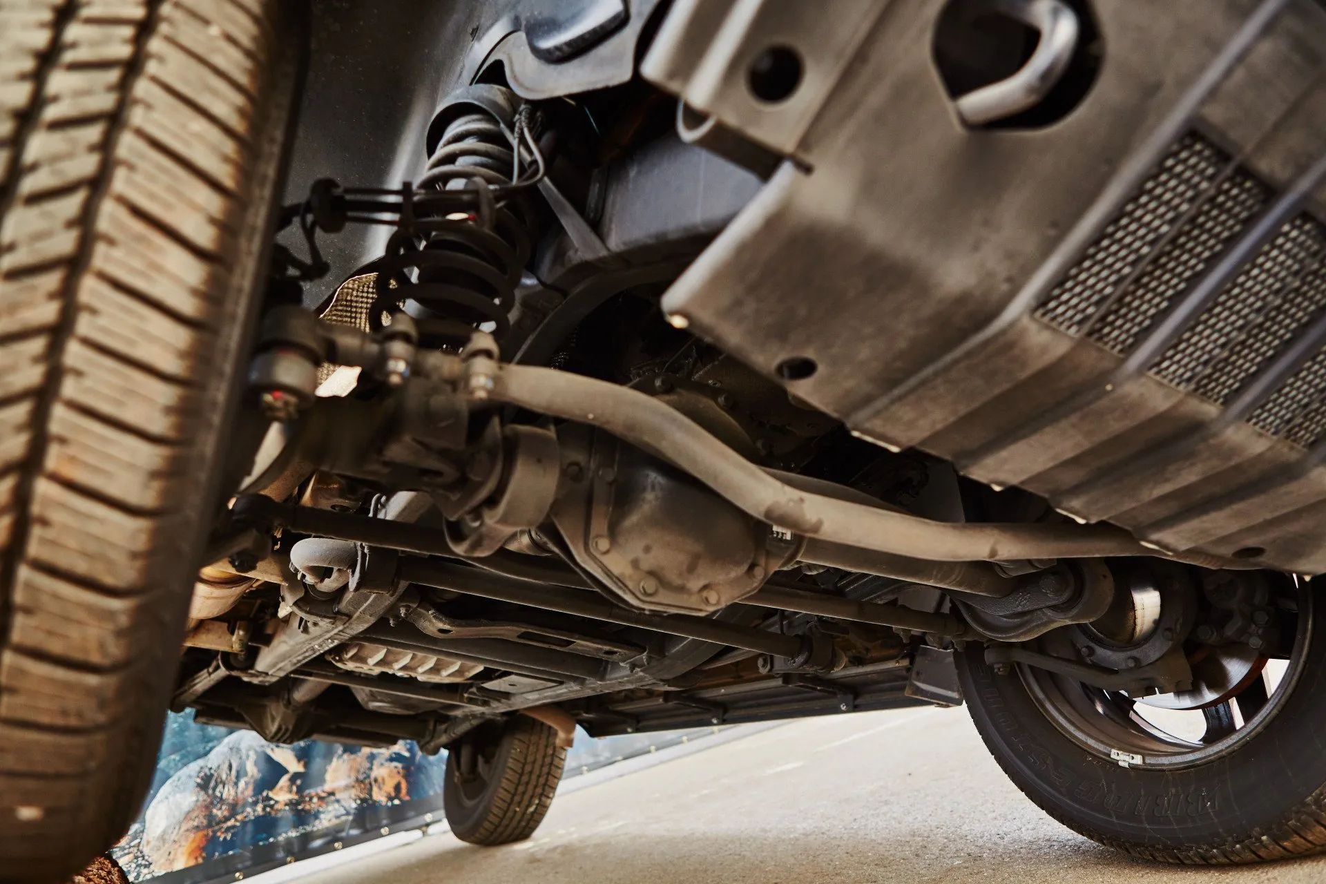 A close up of the underside of a car.