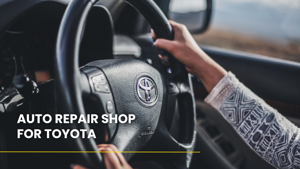 A person is driving a toyota car and holding the steering wheel. | Karta Motorwerks