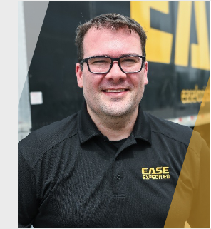A man wearing glasses and a black shirt that says ease expedited