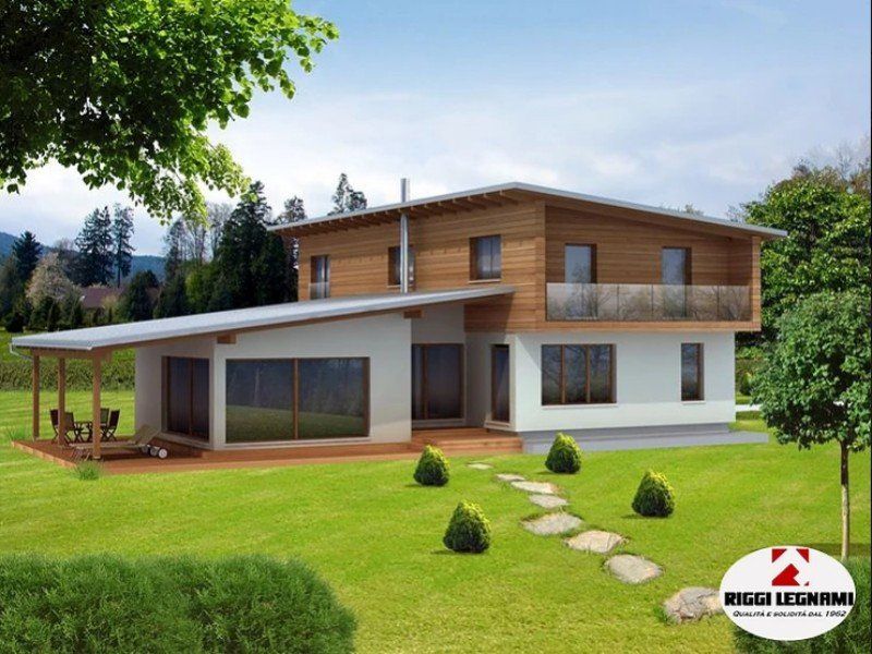 Prato e casa in legno